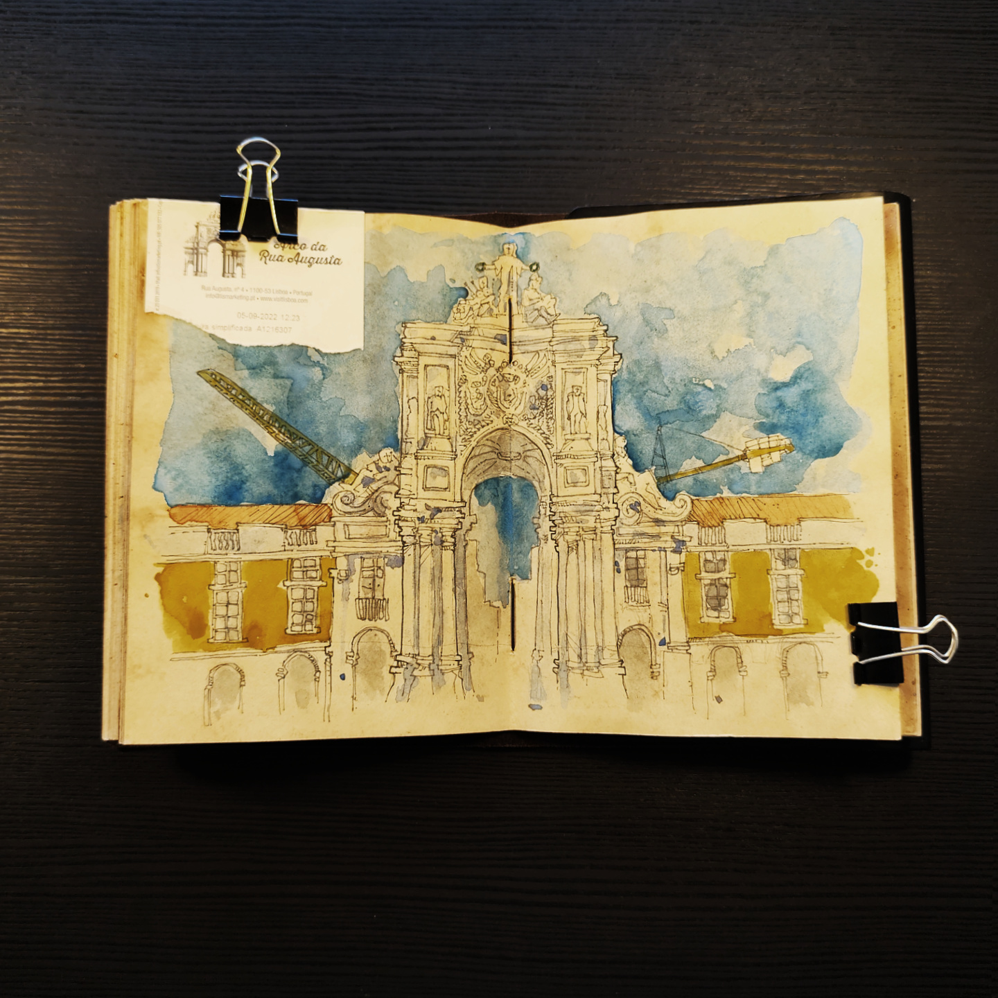 watercolor of Praça do Comércio, in Lisbon, with the Arco da Rua Augusta and scaffolding in the background