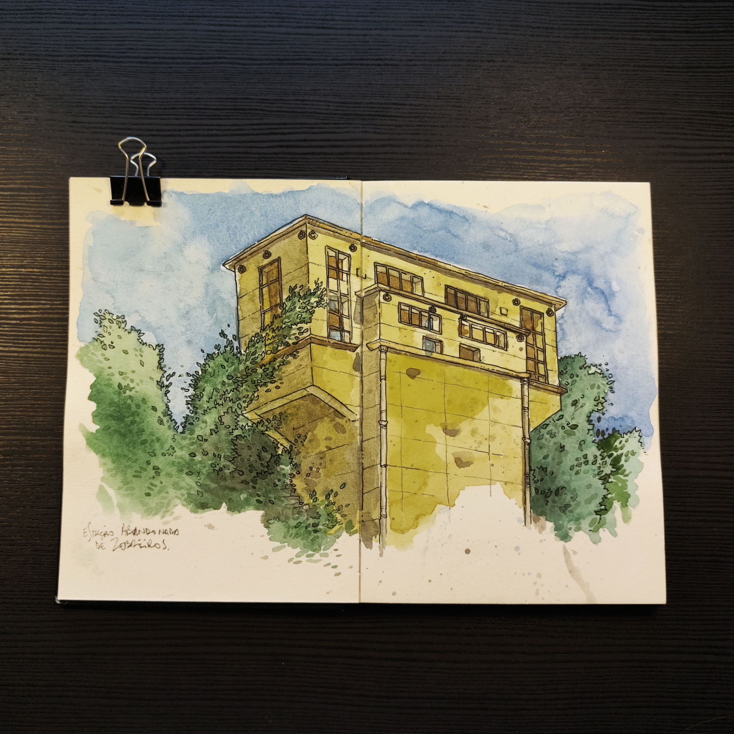 watercolor of the abandoned Zebreiros station, a modernist building hidden among trees