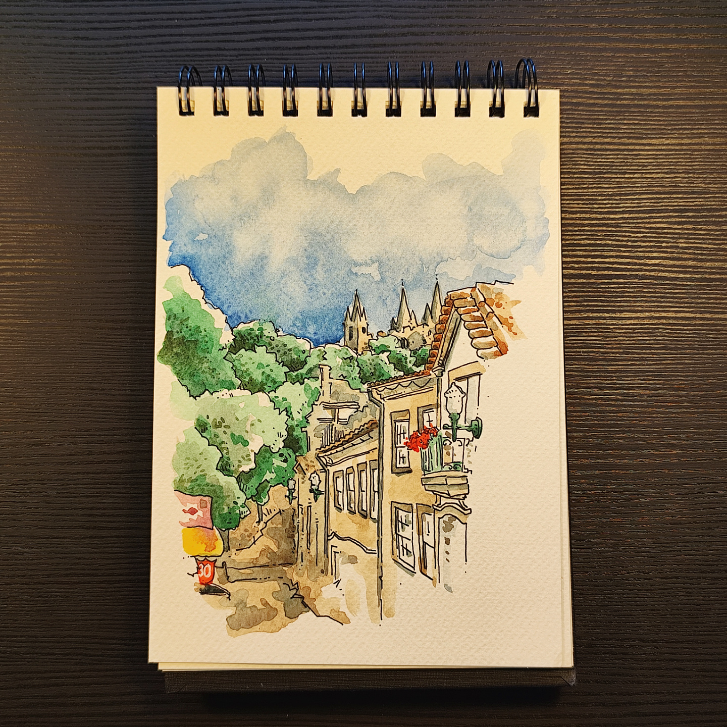 Watercolor at Praça da República in Santa Maria da Feira, with a view of the castle